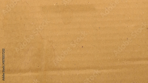 Brown carton texture for background for design and artwork. Abstract brown recycled paper background. Old Kraft paper texture box craft stripes pattern. 