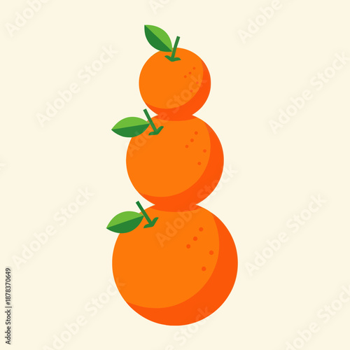 Three Oranges Stacked with Green Leaves.