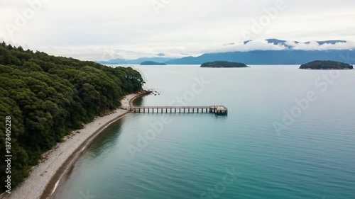 Wallpaper Mural Serene Ocean Coastline with Forested Hills and Distant Island Torontodigital.ca