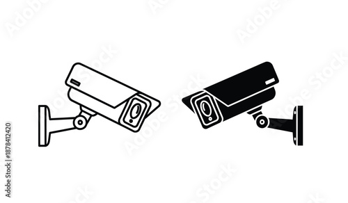 Two security cameras one white and one black on wall mounts