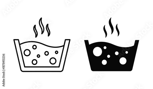 Black and white icon of two steaming bowls with bubbles one filled with a liquid and the other empty