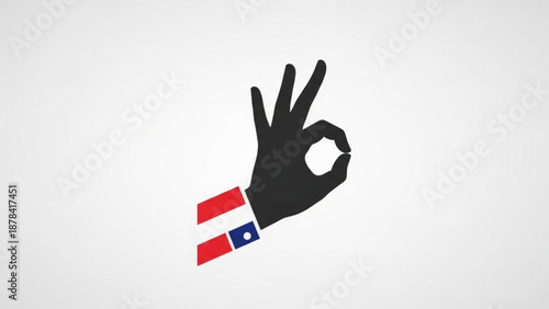 Hand Showing OK Sign with French Flag Cufflink on White Background