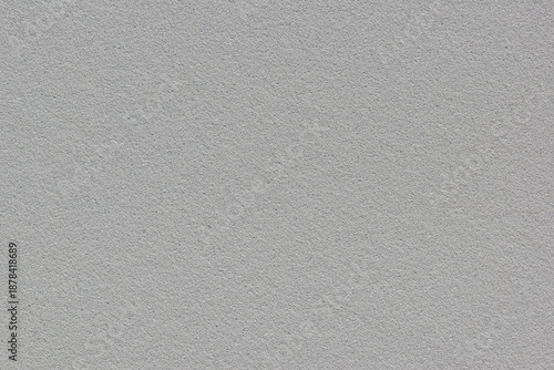 Mid gray sample textured background plain solid material color copy space.