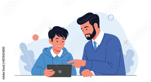 Bearded father sitting with his young son and pointing at a digital tablet screen while helping him with homework or games.