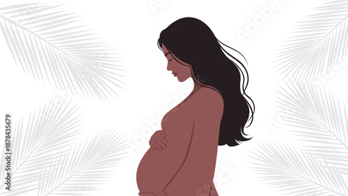 Silhouette of a pregnant woman holding her belly gracefully positioned against a background of soft grey palm leaves for maternity.