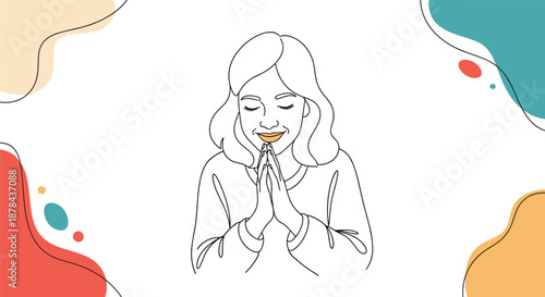 Calm woman with closed eyes and her hands held together in a gesture of prayer, meditation, or heartfelt gratitude.