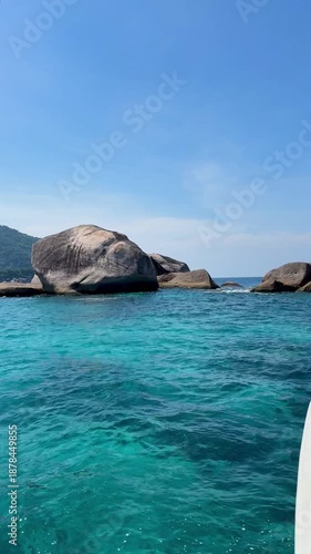 Thailand's Similan Islands, known for their snow-white beaches, crystal clear waters, coral reefs, and rich underwater world. vertical video 4k