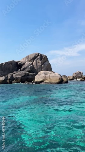 Thailand's Similan Islands, known for their snow-white beaches, crystal clear waters, coral reefs, and rich underwater world. vertical video 4k