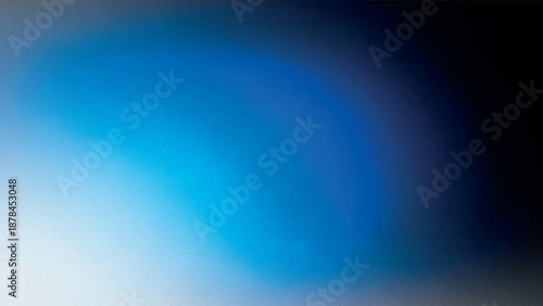 Abstract blurred grainy background with shades of blue and white