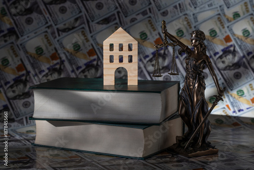 The figure of Themis against the background of $100 US bills