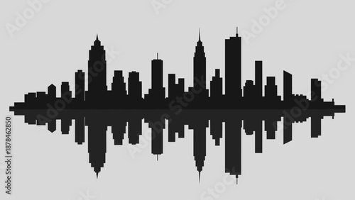 City skyline silhouette with perfect reflection on water surface.