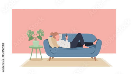 Woman relaxing on a blue couch with a tablet in a cozy living room.