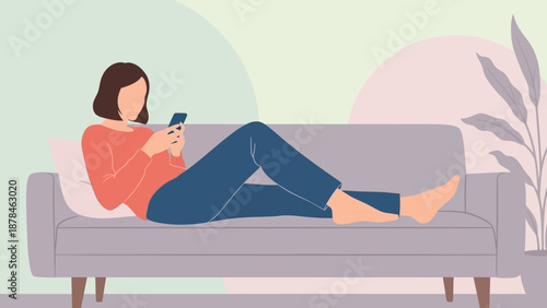 Woman relaxing on a couch using her smartphone in a cozy living room.