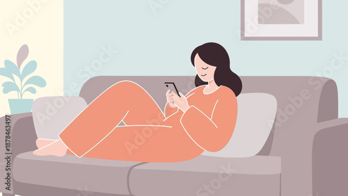 Woman relaxing on sofa using mobile phone at home.
