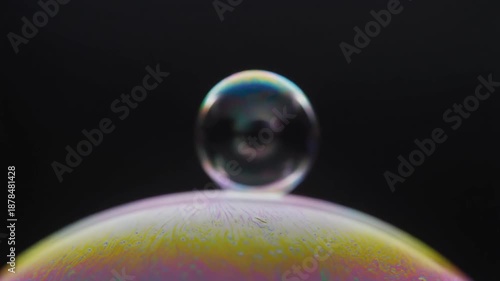 Soap Bubbles Floating on Iridescent Surface.