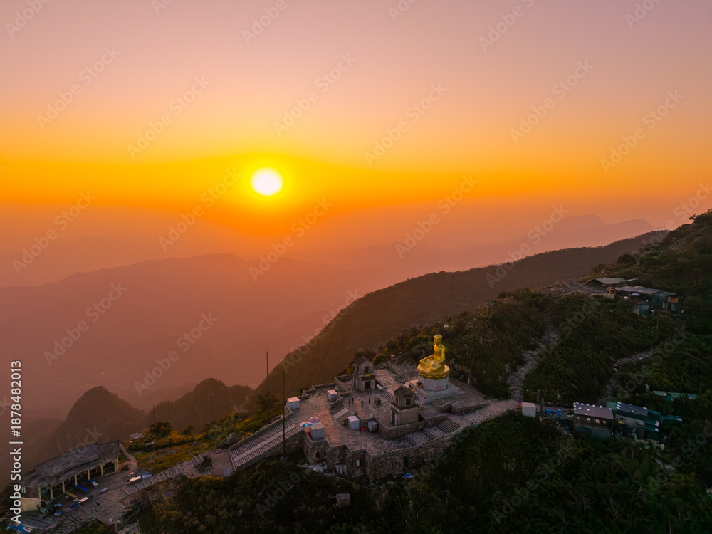 custom made wallpaper toronto digitalView of Golden statue of Buddha sitting in a lotus flower at ancient Buddhist complex at Yen Tu Mountain, Quang Ninh Province, Vietnam