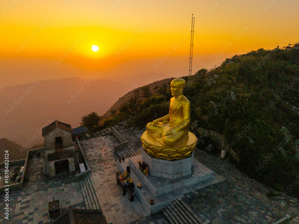 custom made wallpaper toronto digitalView of Golden statue of Buddha sitting in a lotus flower at ancient Buddhist complex at Yen Tu Mountain, Quang Ninh Province, Vietnam