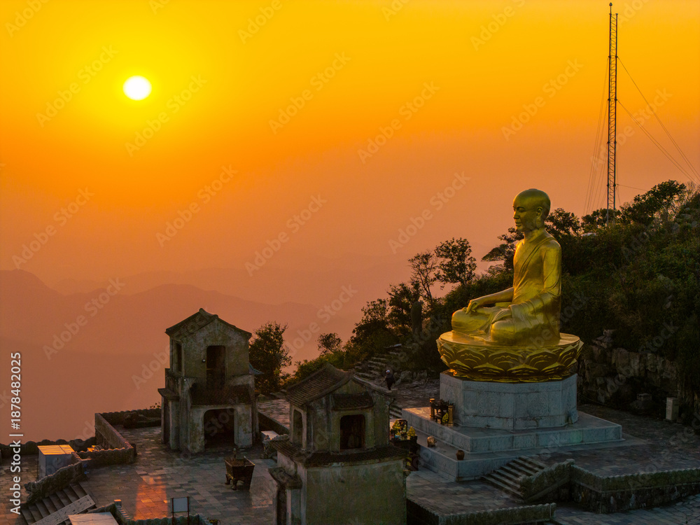 custom made wallpaper toronto digitalView of Golden statue of Buddha sitting in a lotus flower at ancient Buddhist complex at Yen Tu Mountain, Quang Ninh Province, Vietnam