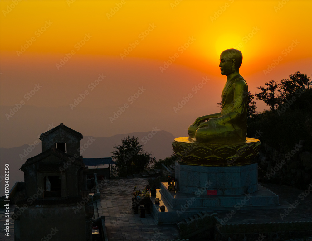 custom made wallpaper toronto digitalView of Golden statue of Buddha sitting in a lotus flower at ancient Buddhist complex at Yen Tu Mountain, Quang Ninh Province, Vietnam