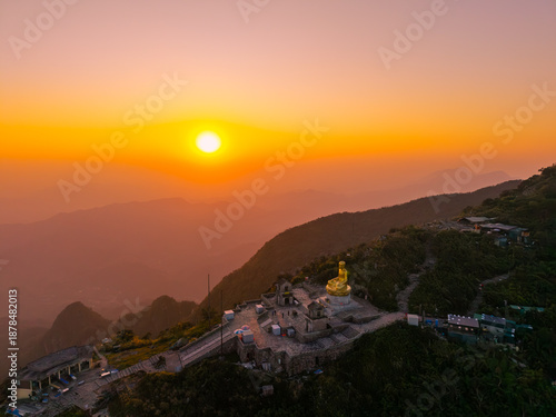Wallpaper Mural View of Golden statue of Buddha sitting in a lotus flower at ancient Buddhist complex at Yen Tu Mountain, Quang Ninh Province, Vietnam Torontodigital.ca
