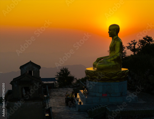 Wallpaper Mural View of Golden statue of Buddha sitting in a lotus flower at ancient Buddhist complex at Yen Tu Mountain, Quang Ninh Province, Vietnam Torontodigital.ca