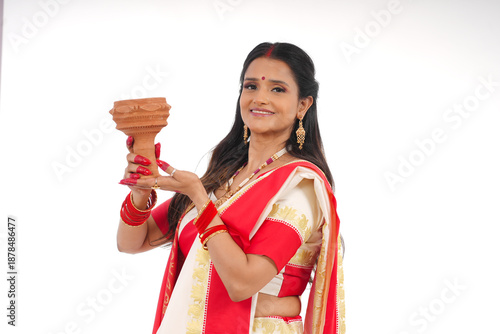 Young women celebrating durga pooja,Bengali Indian women 