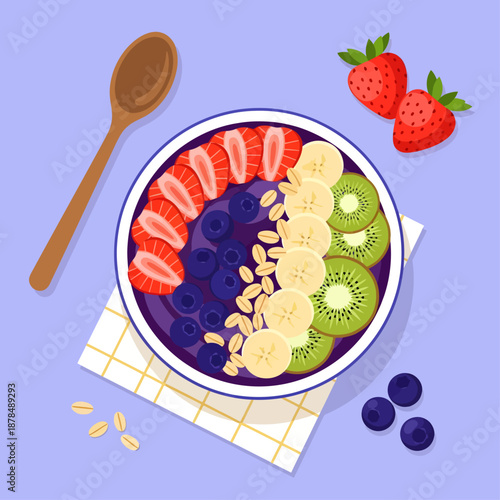 Resting on a checkered napkin, this vibrant acai bowl features neat arcs of sliced strawberries, bananas, and kiwi alongside blueberries and oats, accompanied by a wooden spoon on a purple backdrop