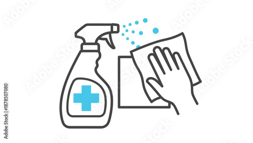 A hand wipes down a surface with a cloth while a disinfectant spray bottle is nearby.