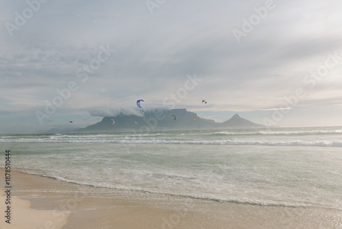 Kite surfers in Cape Town with mountain view