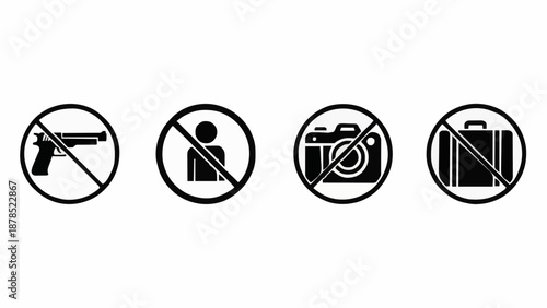 Prohibited sign icons indicating restrictions for firearms, unauthorized personnel, photography, and large carry-on luggage items.
