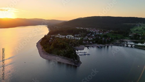 Aerial drone footage of flight over the Schluchsee in the Black Forest in Southern Germany during scenic sunset