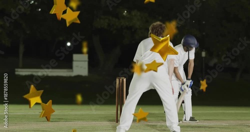 Cricket fielder leaping and appealing out, batsman in helmet playing shot, golden stars appearing