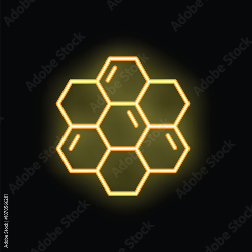 Neon sign representing honeycomb structure glowing yellow on black background