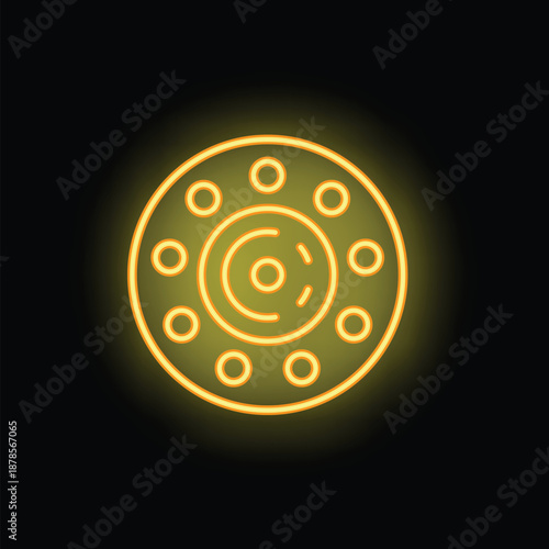 Yellow neon icon of car wheel rim tuning glowing on a black background