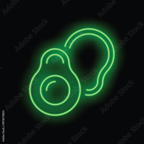 Green neon sign showing an avocado with its pit on a black background
