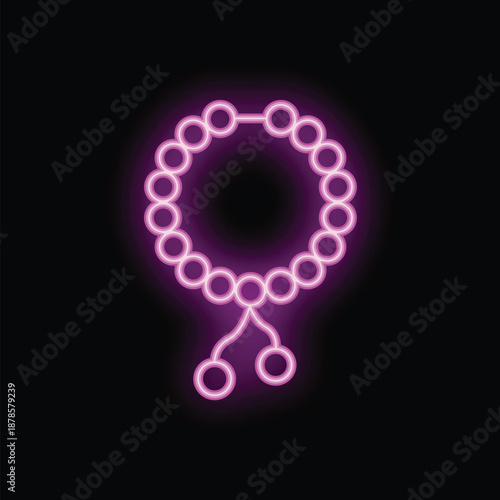 Neon pink rosary beads are glowing on this dark background, perfect for spiritual concepts