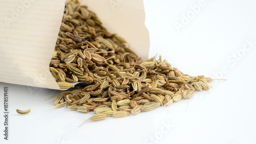 Fennel Seeds Displayed on White Surface – Fresh Aromatic Spice