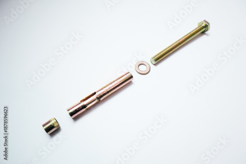 Wallpaper Mural Exploded view of a yellow zinc-plated sleeve anchor bolt on white. Torontodigital.ca