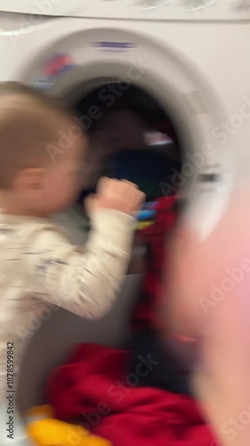 Toddler Helping with Laundry