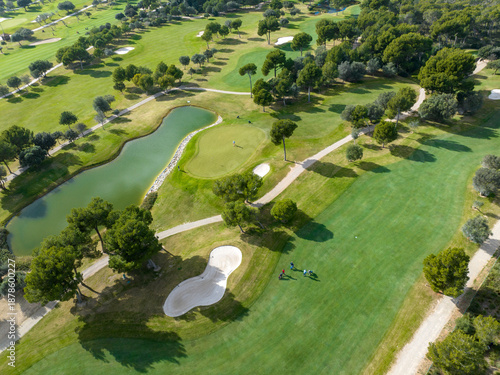 Aerial view, Spain, Balearic Islands, Mallorca, Capdepera, Cuevas de Arta and Platja de Canyamel with golf course, sand bunker, green, golfer