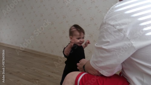 Toddler Joyfully Walking in Sunlit Room
