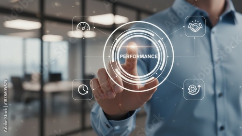 A hand pressing a digital performance icons showing teamwork, speed, goals, and key performance indicator tracking