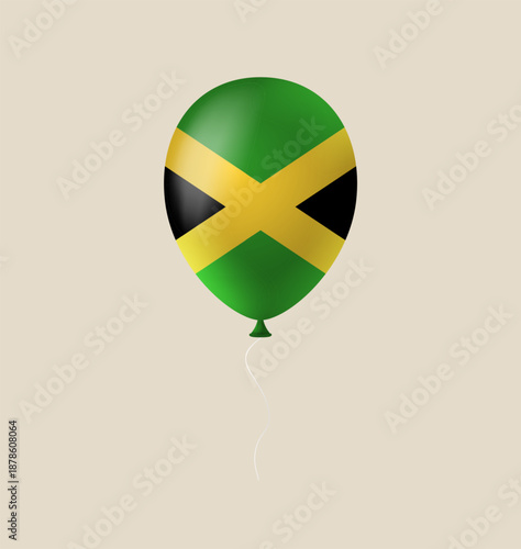 Patriotic Jamaican flag balloon floating as a festive symbol for a national holiday or Independence Day party.