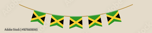 Jamaican flag bunting banner hanging on a string as a festive decoration for a national holiday or event.