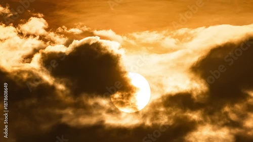 Peaceful sunset time-lapse with warm golden light and fast-moving clouds.