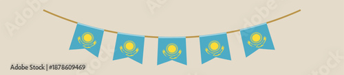 Kazakhstan flag pennant banner hanging as a decorative garland for a national holiday celebration and patriotic event.