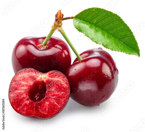 Sweet cherries with green leaf and half of pitted cherry isolated on white background. Cut out PNG file.