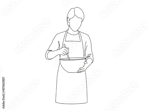 Person wearing apron holding bowl and utensil