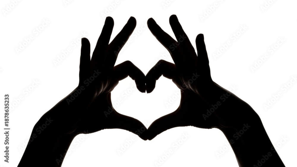 Obraz premium Hands forming a heart shape against a plain background, illustrating love and affection, a symbolic gesture captured from a front view