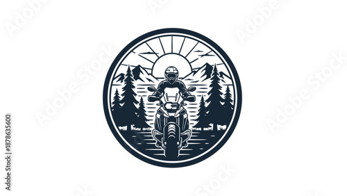 Circular emblem featuring a motorcycle rider on a scenic mountain road surrounded by pine trees and a rising sun.